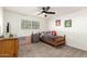 This bedroom features a ceiling fan and themed decor, creating a fun and inviting space at 2350 E Melrose St, Gilbert, AZ 85297