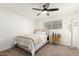 Bedroom features neutral walls and carpeted floors, creating a warm and inviting atmosphere at 2350 E Melrose St, Gilbert, AZ 85297
