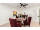Inviting dining room with round table, colorful floral arrangement, and classic decor at 2350 E Melrose St, Gilbert, AZ 85297