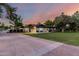 Well-maintained single-story home with a long driveway and a spacious, beautifully landscaped front yard at 2350 E Melrose St, Gilbert, AZ 85297