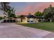 Well-maintained single-story home with a long driveway and a spacious, beautifully landscaped front yard at 2350 E Melrose St, Gilbert, AZ 85297