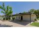 Side view of home showing carport, landscaping and walkway at 2350 E Melrose St, Gilbert, AZ 85297