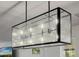 Close up view of a stylish modern light fixture in the dining room at 2350 E Melrose St, Gilbert, AZ 85297