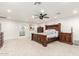 Spacious bedroom with carpet flooring and ensuite bathroom at 2350 E Melrose St, Gilbert, AZ 85297