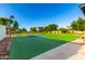 Outdoor tennis court for recreation and sport, complete with a net and fencing at 2350 E Melrose St, Gilbert, AZ 85297