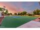 Outdoor tennis court for recreation and sport, complete with a net and fencing at 2350 E Melrose St, Gilbert, AZ 85297