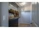 Walk-in closet with shelving featuring organized storage for pillows, blankets and fan at 26062 W Potter Dr, Buckeye, AZ 85396