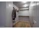 Well-organized walk-in closet with shelving provides ample space for storage at 26062 W Potter Dr, Buckeye, AZ 85396