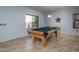 Game room featuring a pool table and a view of the backyard at 26062 W Potter Dr, Buckeye, AZ 85396