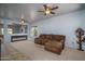 Spacious living room with neutral carpet and backyard views at 26062 W Potter Dr, Buckeye, AZ 85396