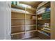 Pantry with organized shelving provides ample storage for various household items at 26062 W Potter Dr, Buckeye, AZ 85396