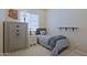 Cozy bedroom featuring neutral walls, a twin bed and a classic nightstand with a charming lamp at 26624 N 41St St, Cave Creek, AZ 85331