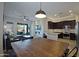 Open-concept dining room flowing into the kitchen and living room at 26624 N 41St St, Cave Creek, AZ 85331