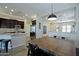 Open-concept dining room flowing into the kitchen, perfect for entertaining guests at 26624 N 41St St, Cave Creek, AZ 85331