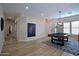 Open game room showcasing a pool table, neutral walls, and light wood floors at 26624 N 41St St, Cave Creek, AZ 85331