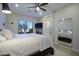 Bright main bedroom featuring a fireplace and ensuite bathroom at 26624 N 41St St, Cave Creek, AZ 85331