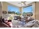 Inviting living room featuring a fireplace, comfortable seating, and large windows with stunning views at 28990 N White Feather Ln # 185, Scottsdale, AZ 85262