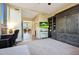 Bright living area with a built-in storage unit and a desk area at 28990 N White Feather Ln # 185, Scottsdale, AZ 85262