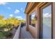 Private patio with natural desert landscaping just off the main bedroom at 28990 N White Feather Ln # 185, Scottsdale, AZ 85262