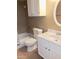 Clean bathroom with white fixtures, tiled shower and floors, and an elegant oval mirror at 30 E Brown Rd # 2065, Mesa, AZ 85201