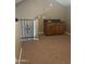 Upstairs living space with railing and built-in bar and sink at 30 E Brown Rd # 2065, Mesa, AZ 85201