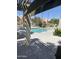 Community pool with a serene ambiance, surrounded by well-kept landscaping and privacy fencing at 30 E Brown Rd # 2065, Mesa, AZ 85201