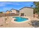 Backyard features a pool and low maintenance desert landscaping at 30032 N Desert Willow Blvd, San Tan Valley, AZ 85143