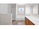 A bright bathroom features a tub, shower and double sinks at 30032 N Desert Willow Blvd, San Tan Valley, AZ 85143
