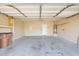 A spacious two-car garage with ample storage and an automatic door at 30032 N Desert Willow Blvd, San Tan Valley, AZ 85143