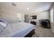 Cozy bedroom with carpet, workstation and serene atmosphere for rest and productivity at 30560 W Weldon Ave, Buckeye, AZ 85396