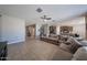 Spacious living area merges seamlessly with an open kitchen, creating an ideal flow for gatherings at 30560 W Weldon Ave, Buckeye, AZ 85396