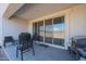 Covered patio featuring a concrete floor, a grill and sliding glass doors that lead into the house at 30560 W Weldon Ave, Buckeye, AZ 85396