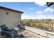 Balcony area with furniture, decorative outdoor rug and views of the surrounding landscape at 31156 N 137Th Ln, Peoria, AZ 85383