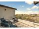 Private balcony with seating, offering serene views of the surrounding neighborhood at 31156 N 137Th Ln, Peoria, AZ 85383