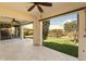Covered patio with views of the backyard and fountain at 31156 N 137Th Ln, Peoria, AZ 85383