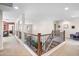 Open foyer with staircase overlooking the living and dining areas, showcasing a modern design at 31156 N 137Th Ln, Peoria, AZ 85383