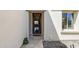 Entryway with decorative screen door and stone landscaping at 31156 N 137Th Ln, Peoria, AZ 85383