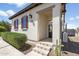 Charming home entrance with decorative tile steps, gate, and desert landscaping at 31156 N 137Th Ln, Peoria, AZ 85383