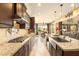 Spacious kitchen with granite countertops, stainless steel sink, and lots of cabinets at 31156 N 137Th Ln, Peoria, AZ 85383