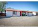 Single-story home featuring low-maintenance landscaping, a gravel yard, and a two-car garage at 3209 W Charleston Ave, Phoenix, AZ 85053