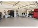 Spacious garage featuring washer and dryer, tool storage, and ample room for vehicles at 3345 E University Dr # 72, Mesa, AZ 85213