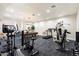 Home gym featuring treadmill, weights, and exercise bike, promoting a healthy lifestyle at 3345 E University Dr # 72, Mesa, AZ 85213