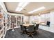 Well-stocked library or study area with custom shelves, seating, and natural light at 3345 E University Dr # 72, Mesa, AZ 85213