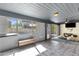 Bright bonus room featuring large windows, tile flooring, and an entertainment area at 3711 S Judd St, Tempe, AZ 85282