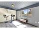 Bonus room with tiled floor, a bar table and a comfortable place to relax at 3711 S Judd St, Tempe, AZ 85282