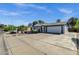 Inviting single-Gathering home boasts a spacious driveway and xeriscape landscaping at 3711 S Judd St, Tempe, AZ 85282