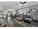 Spacious living area flowing into the dining room, featuring stylish decor and abundant natural light at 3711 S Judd St, Tempe, AZ 85282