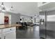 Open floor plan offers a seamless transition from the kitchen to the dining and living areas at 3711 S Judd St, Tempe, AZ 85282