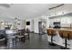 Open-concept living space connecting the kitchen, dining, and living areas, perfect for entertaining at 3711 S Judd St, Tempe, AZ 85282
