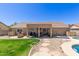Spacious backyard with a covered patio, perfect for outdoor entertaining and relaxation at 3784 E Simpson Ct, Gilbert, AZ 85297